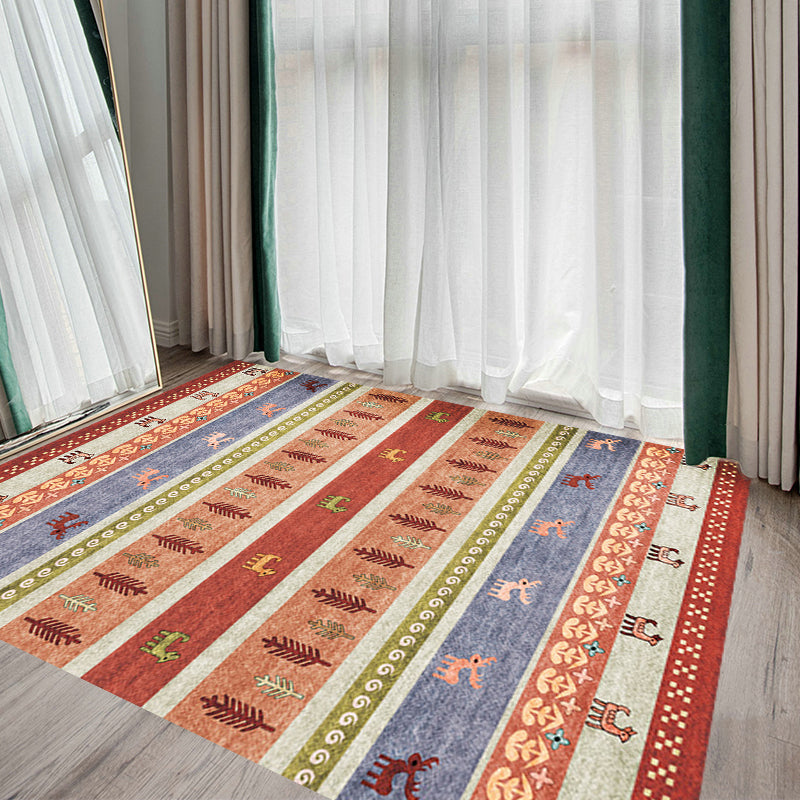 Skorter | Bohemian striped geometric rug with botanical and animal motifs synthetic non-slip backing pet-friendly area rug