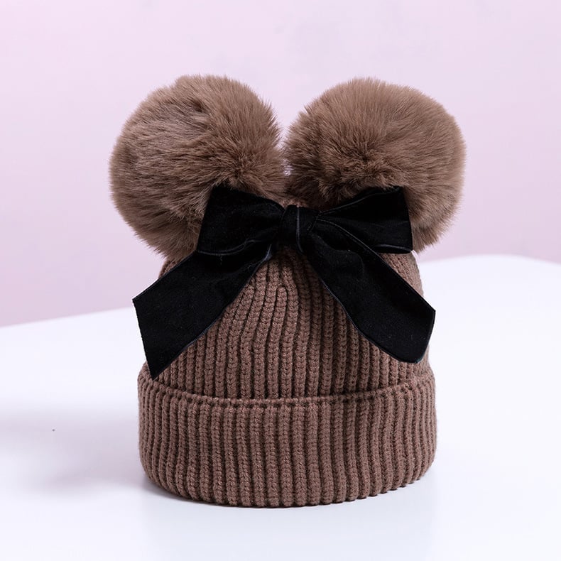 Skorter | Baby hat with double ball bow