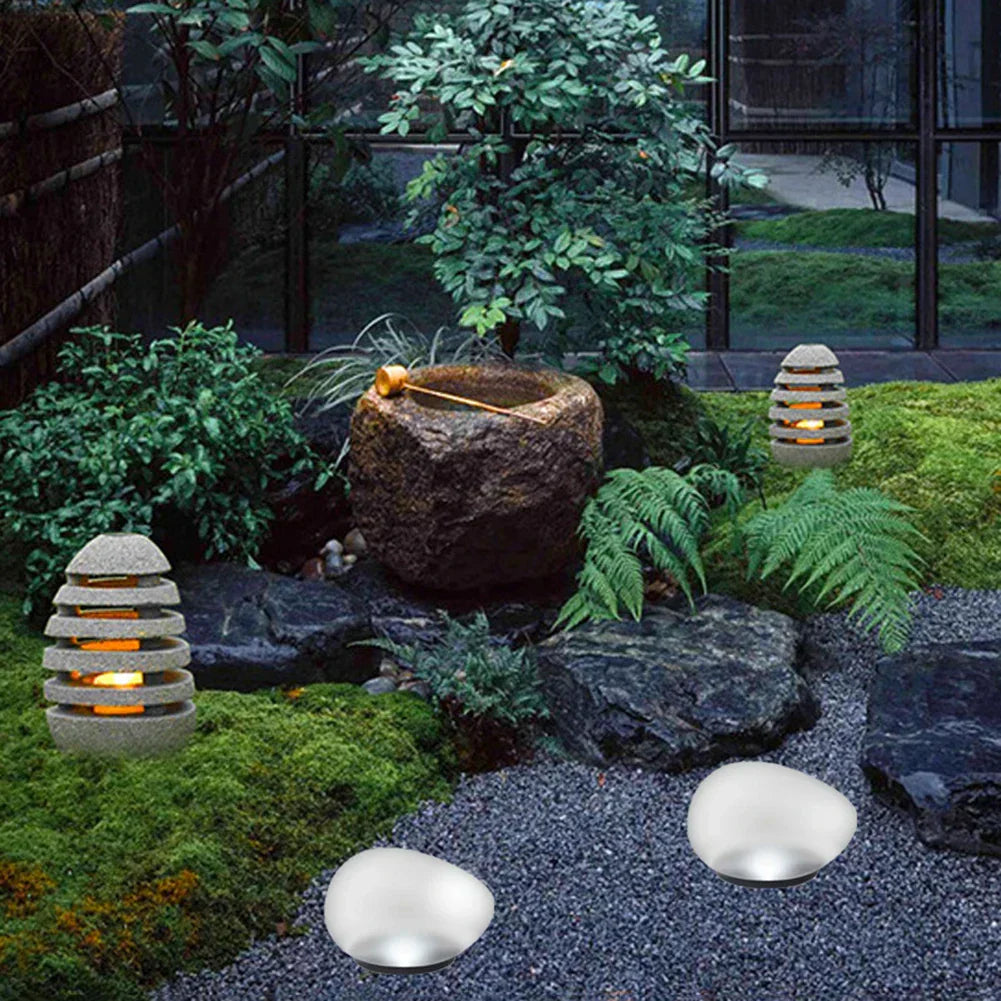 Skorter | GlowPebble - Solar-powered LED Candle for Garden and Path