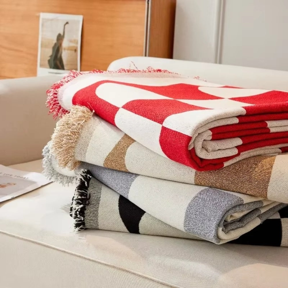 Skorter | Chess Board Chic Tasseled Sofa Cover
