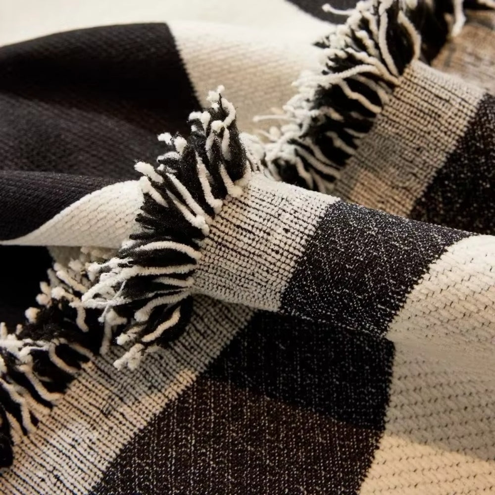 Skorter | Chess Board Chic Tasseled Sofa Cover