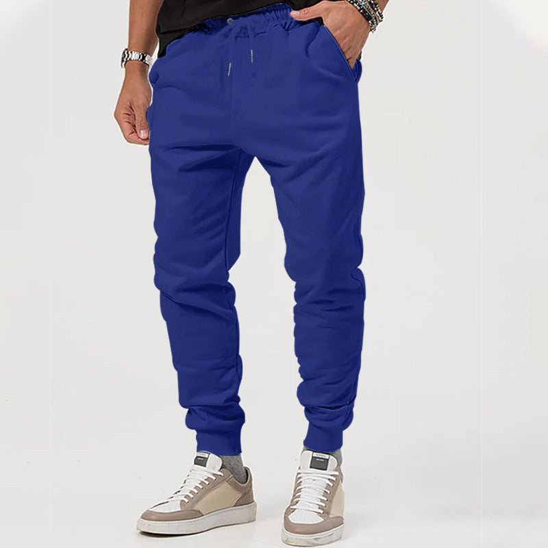 Men's sporty jogging pants with adjustable drawstring and elastic cuffs Skorter