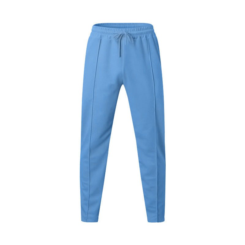 Men's sporty jogging pants with elastic waistband and side inserts Skorter