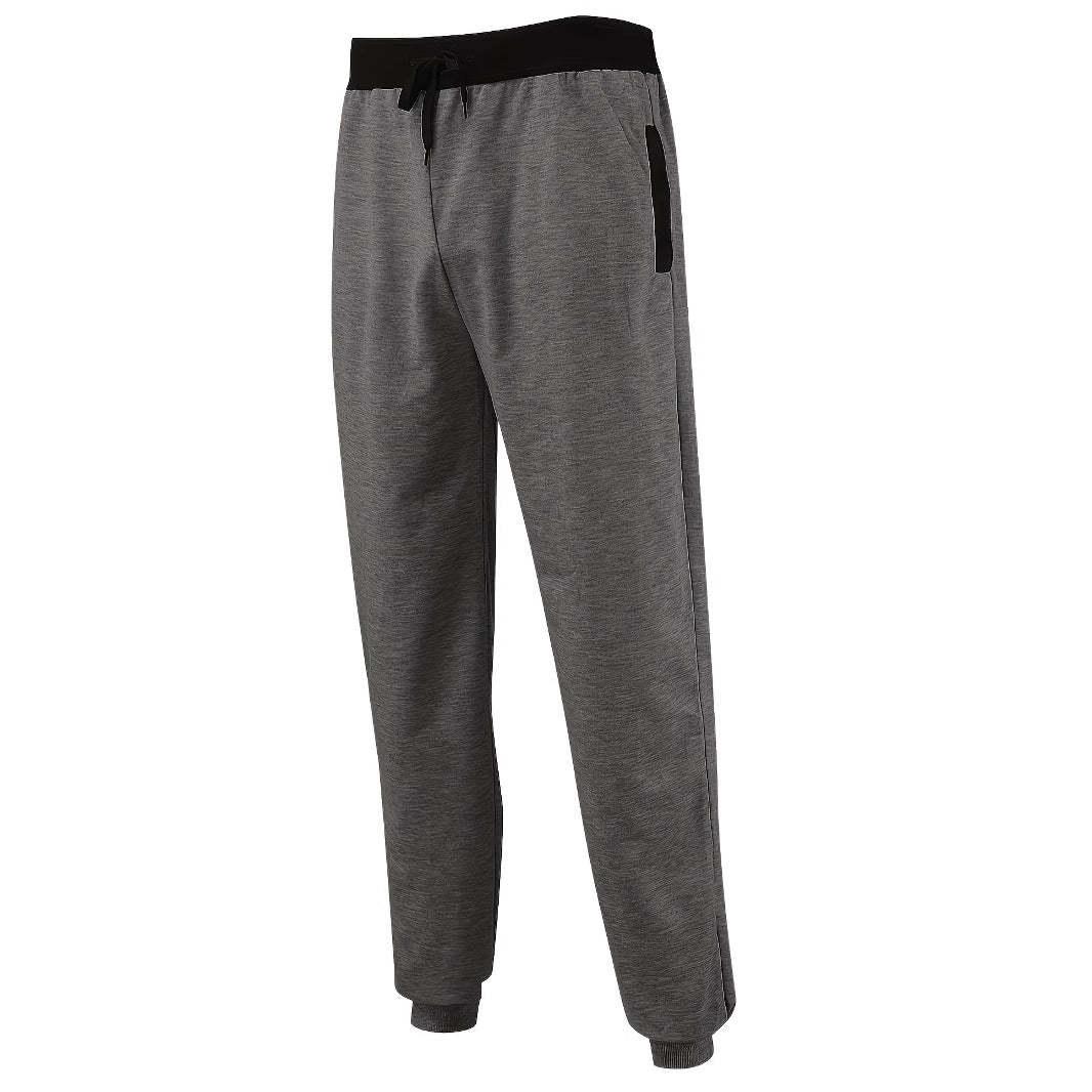 Men's sporty jogging pants with incorporated side pockets and adjustable drawstring Skorter