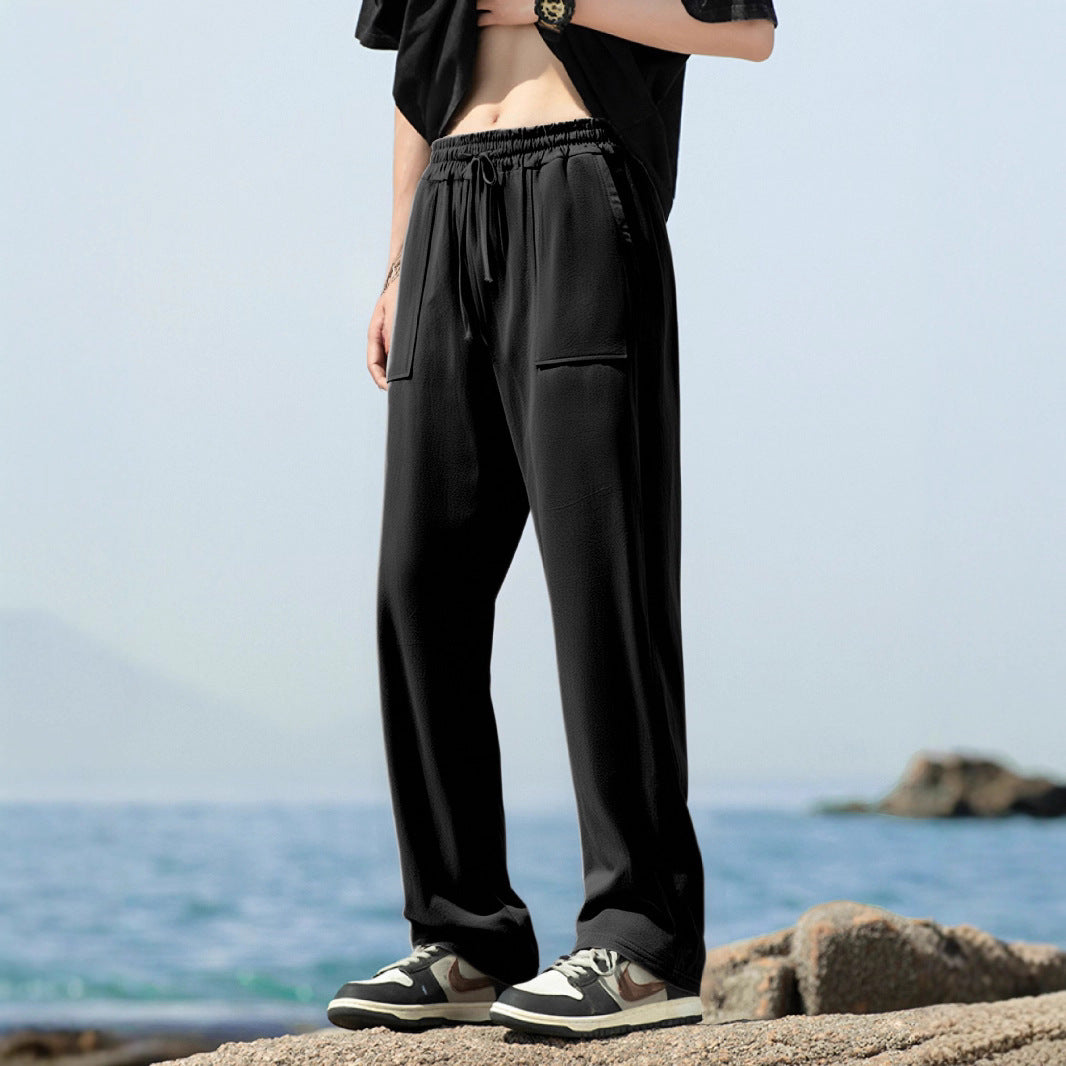 Men's sporty leisure pants with side pockets and elastic waistband Skorter