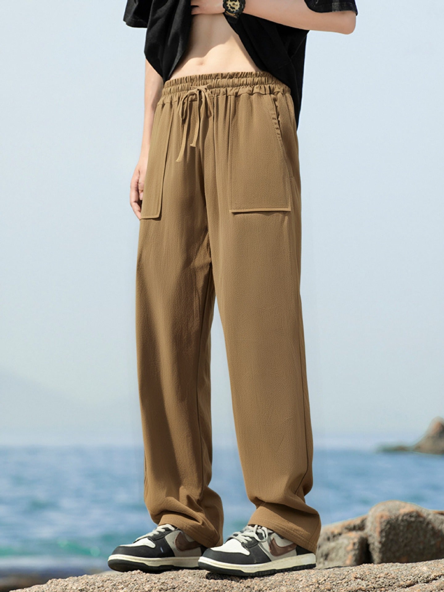 Men's sporty leisure pants with side pockets and elastic waistband Skorter