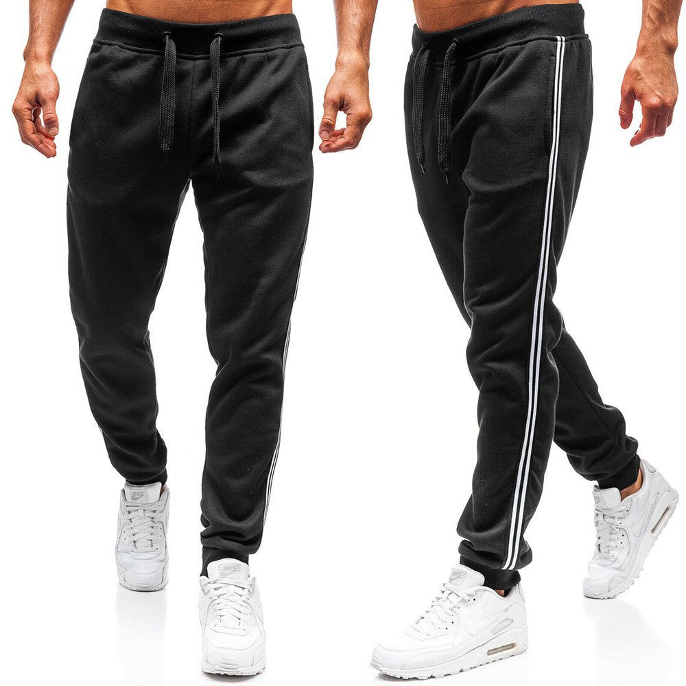 Men's sporty sweatpants with side stripes Skorter