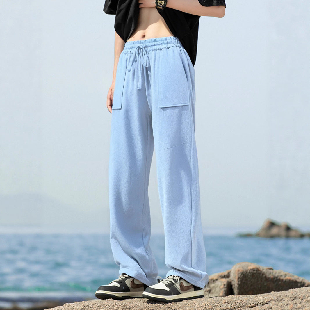 Men's sporty leisure pants with side pockets and elastic waistband Skorter