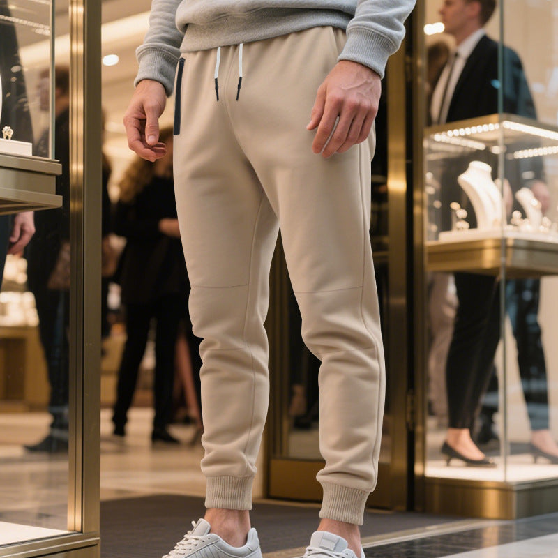 Men's sporty jogging pants with elastic waistband and practical pockets Skorter