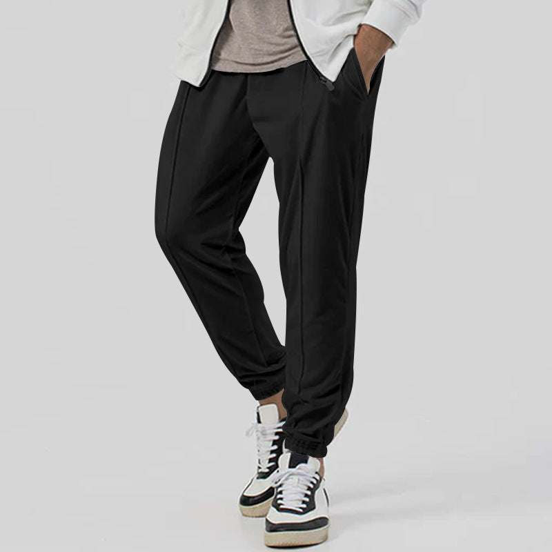 Men's Sporty Jogging Pants with Elastic Waistband and Practical Pockets Skorter