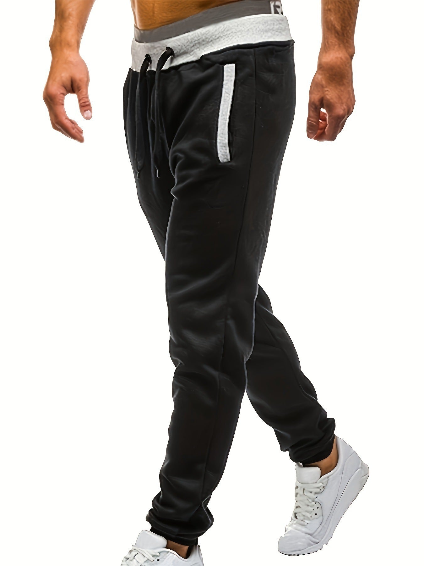 Men's sporty jogging pants with incorporated side pockets and adjustable drawstring Skorter