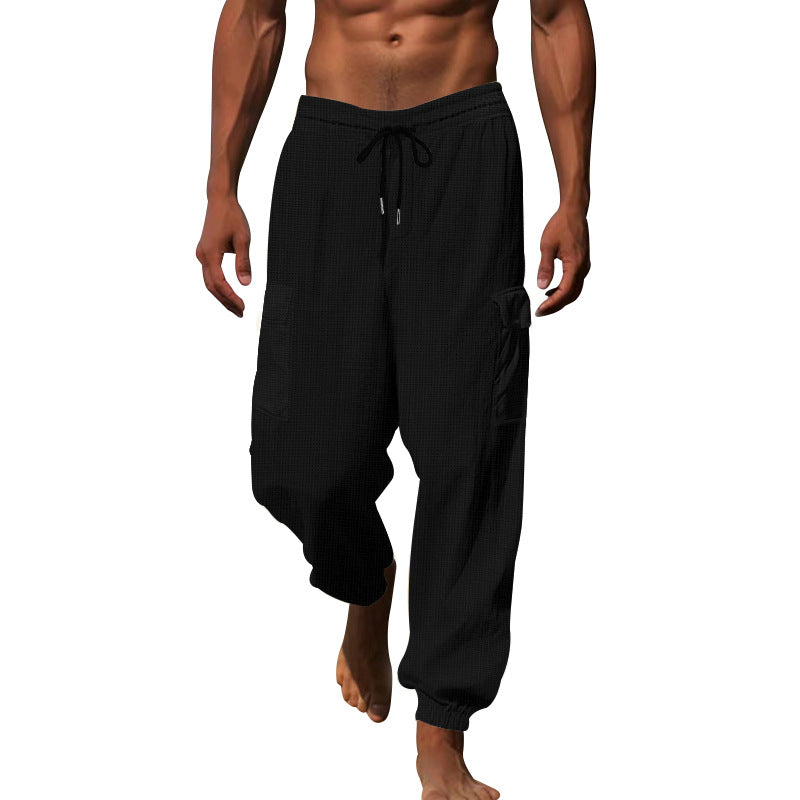 Men's cargo pants with elastic waistband and practical side pockets Skorter