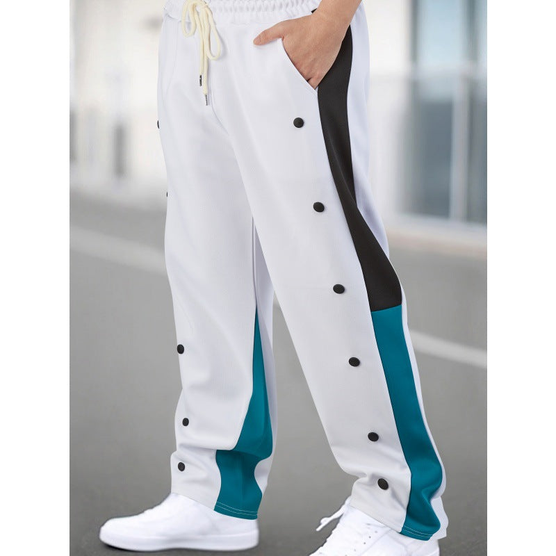 Men's sporty training pants with snap button closure and breathable structure Skorter