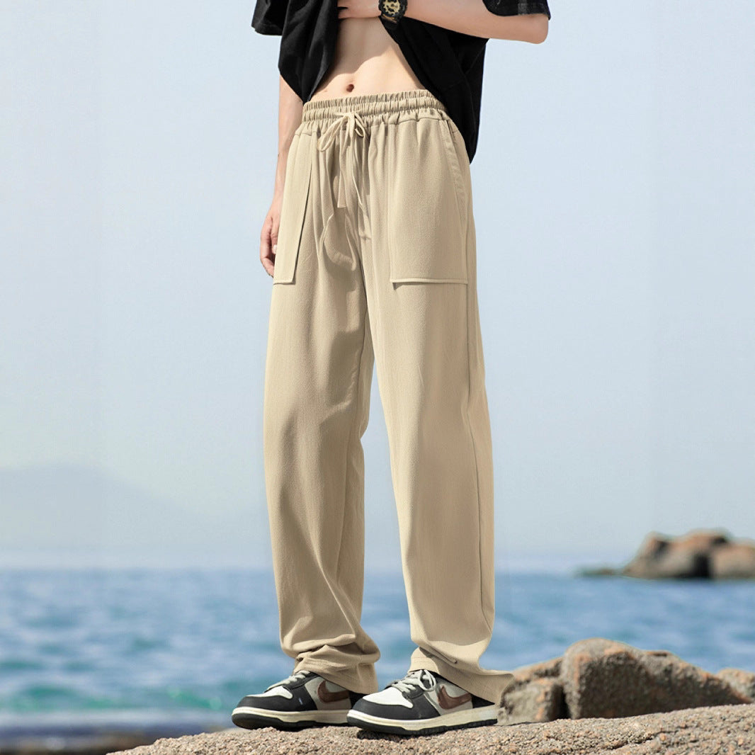 Men's sporty leisure pants with side pockets and elastic waistband Skorter