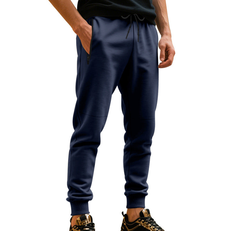 Men's sporty jogging pants with elastic waistband and practical pockets Skorter