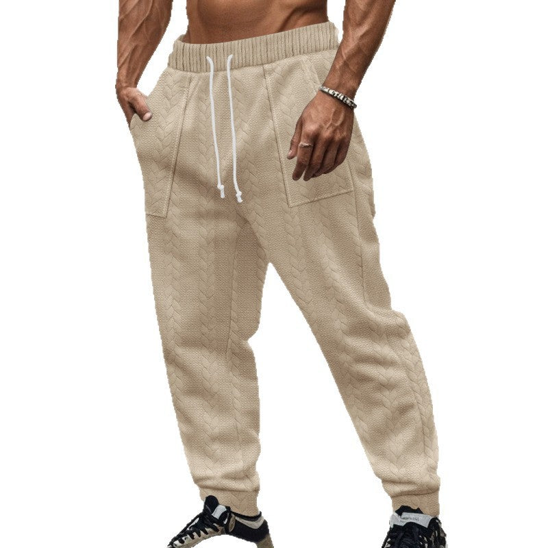 Men's sporty joggers with textured design and elastic waistband Skorter