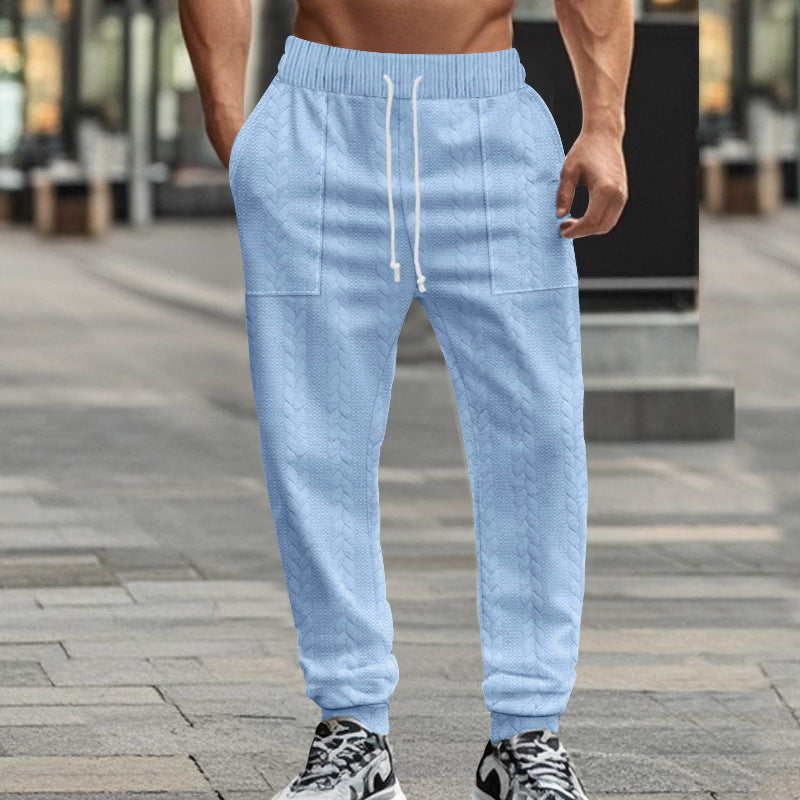 Men's sporty joggers with textured design and elastic waistband Skorter
