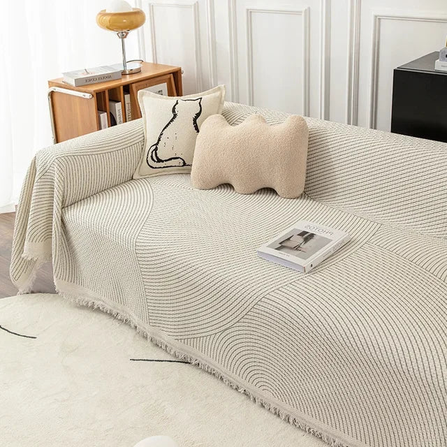 Skorter | NordicNest - Sofa cover with tassel edge