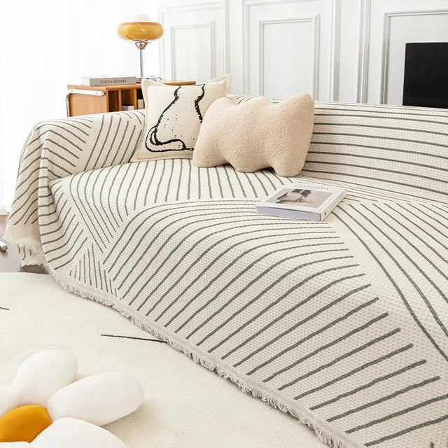 Skorter | NordicNest - Sofa cover with tassel edge