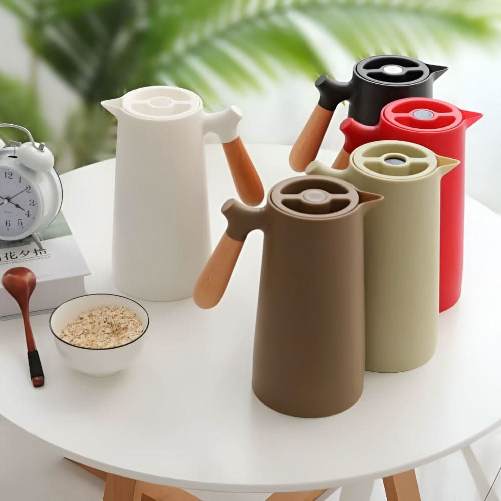 Skorter | Elegant double-walled glass carafe with wooden handle for hot and cold drinks