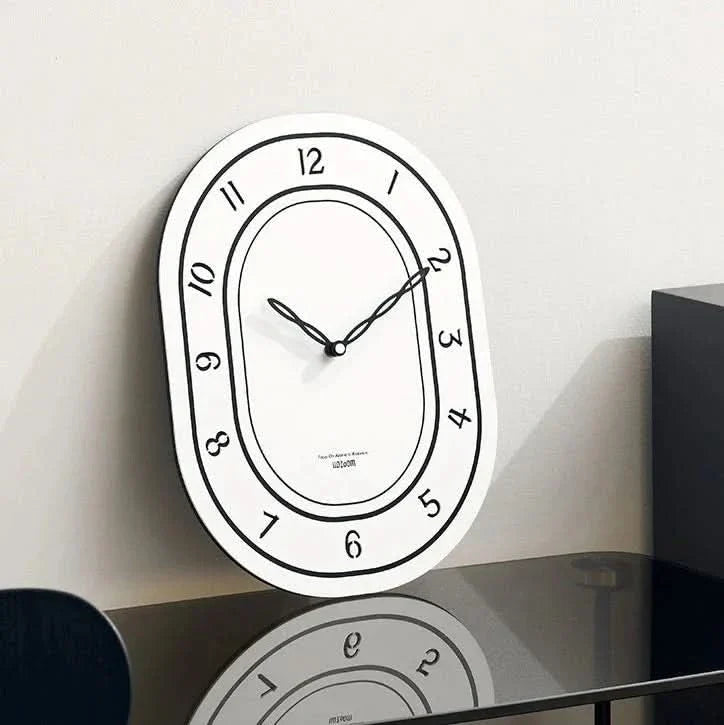 Skorter | Silent Oval Wall Clock with Roman Numerals Design