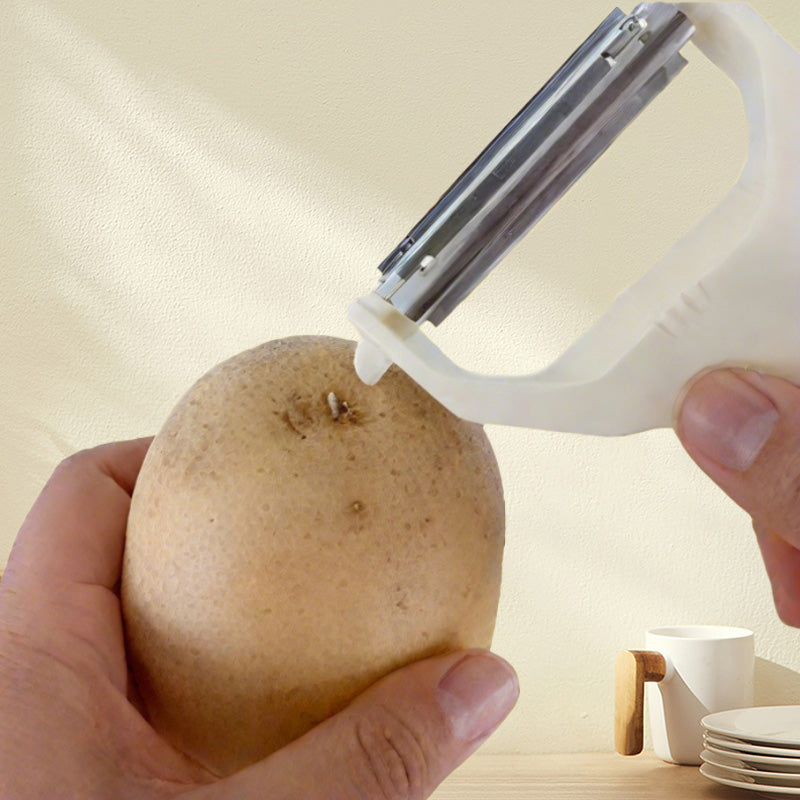 Skorter | 2-in-1 peeler and grater with two heads