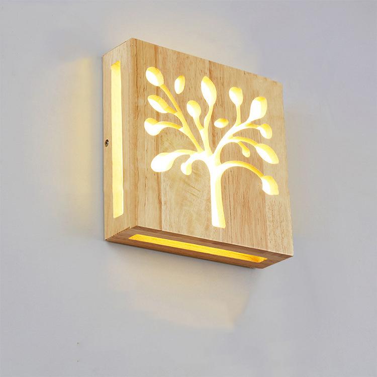 Skorter | NatureShine - Modern LED wall lamp made of solid wood with playful design