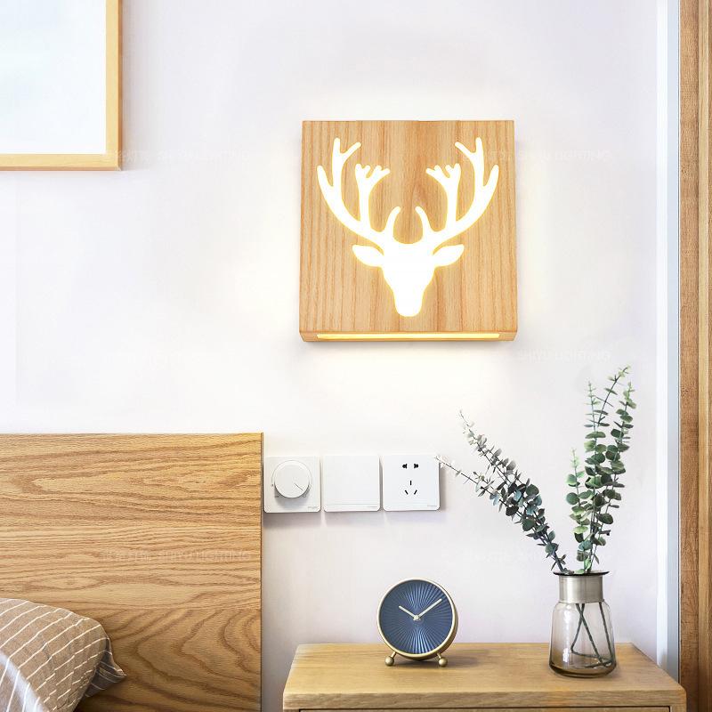 Skorter | NatureShine - Modern LED wall lamp made of solid wood with playful design