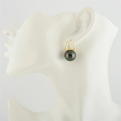 Skorter | Black Pearl Earrings  Available in White Champagne Grey Gold and Black  Pearl Dangle Earrings