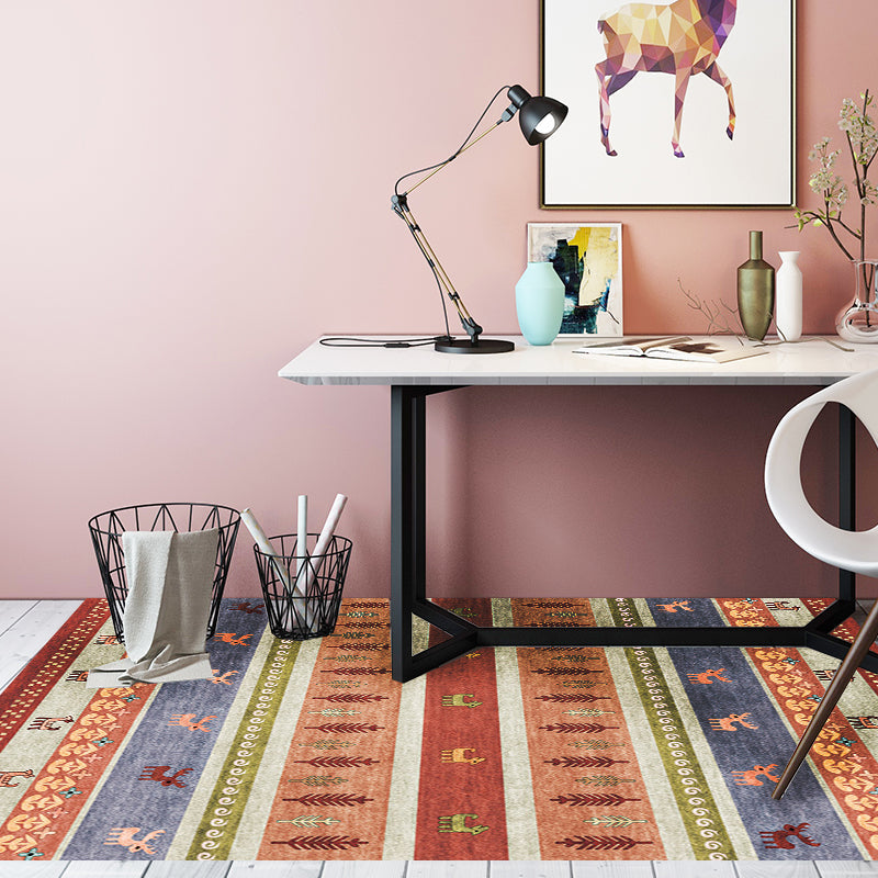 Skorter | Bohemian striped geometric rug with botanical and animal motifs synthetic non-slip backing pet-friendly area rug