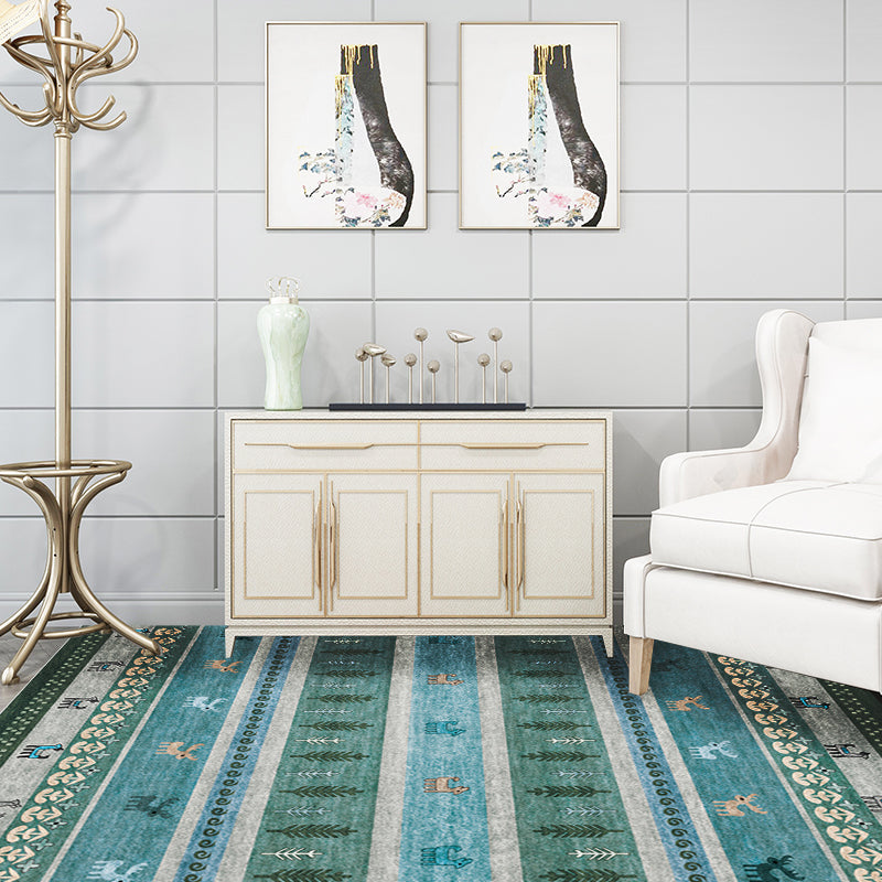 Skorter | Bohemian striped geometric rug with botanical and animal motifs synthetic non-slip backing pet-friendly area rug