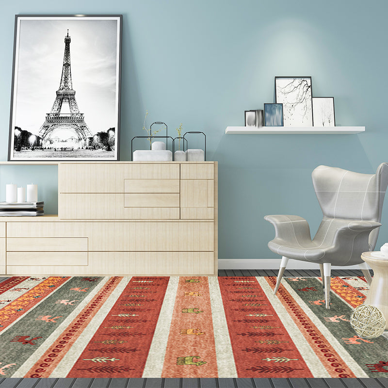 Skorter | Bohemian striped geometric rug with botanical and animal motifs synthetic non-slip backing pet-friendly area rug