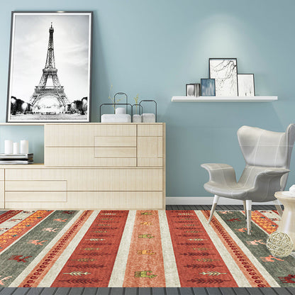 Skorter | Bohemian striped geometric rug with botanical and animal motifs synthetic non-slip backing pet-friendly area rug