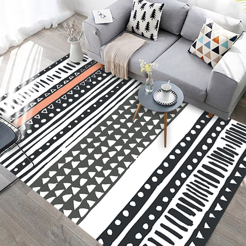 Skorter | Black and white geometric rug with lines and triangles Southwestern pet-friendly area rug for the living room