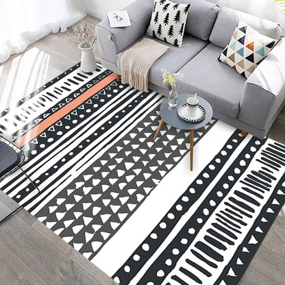 Skorter | Black and white geometric rug with lines and triangles Southwestern pet-friendly area rug for the living room