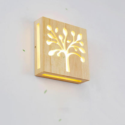 Skorter | NatureShine - Modern LED wall lamp made of solid wood with playful design