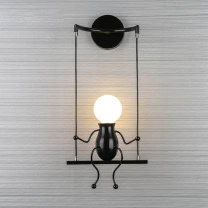 Skorter | SwingDesign - Modern wall lamp with swinging figure
