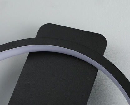 Skorter | Modern, minimalist, clock-shaped LED wall lamp with 1 light