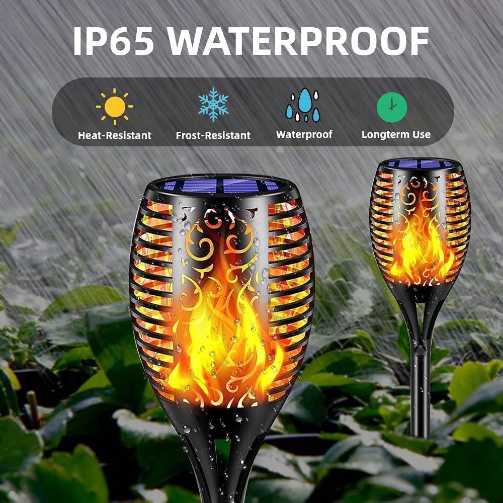 Skørter | 4 Pack Solar Torch Lights with Flickering Flame Outdoor, Waterproof Dancing Flickering Torch Lights, LED Outdoor Landscape Decorative Lights for Garden Terrace Pathway, Automatic On/Off Dusk to Dawn