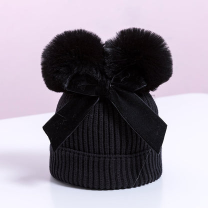 Skorter | Baby hat with double ball bow