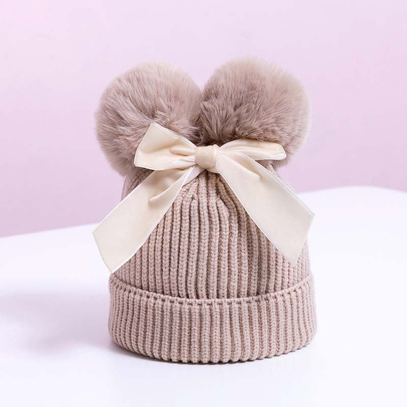 Skorter | Baby hat with double ball bow