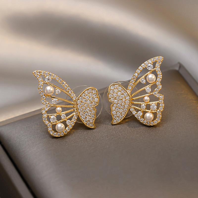 Skorter | Butterfly earrings with pearls and diamonds