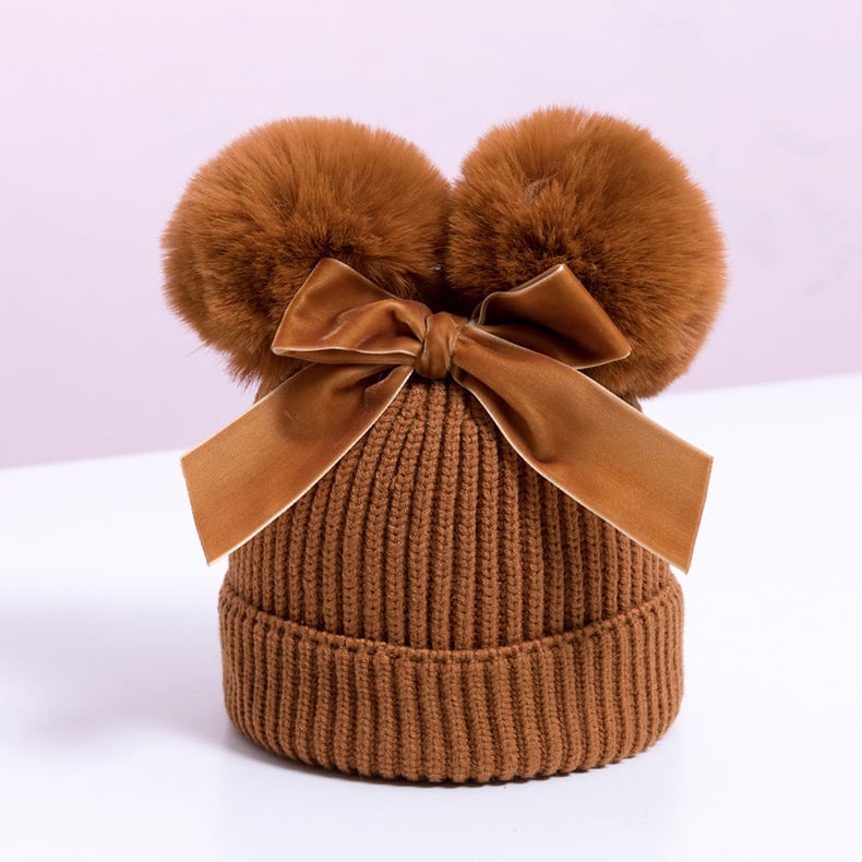 Skorter | Baby hat with double ball bow