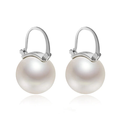 Skorter | Black Pearl Earrings  Available in White Champagne Grey Gold and Black  Pearl Dangle Earrings