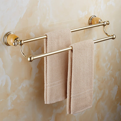 Skorter | Contemporary brushed brass bathroom accessories as a single piece or as a set