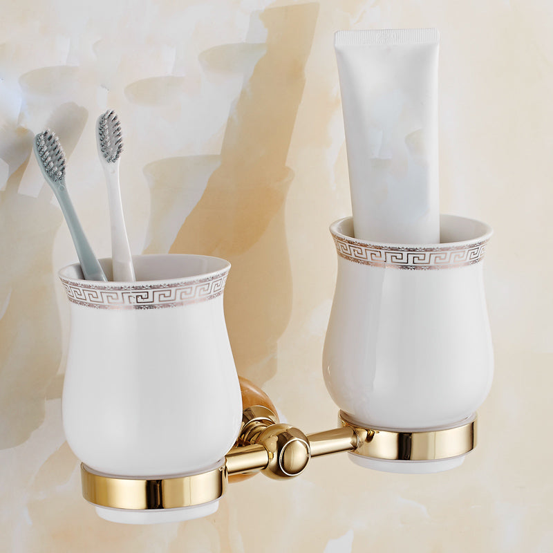Skorter | Contemporary brushed brass bathroom accessories as a single piece or as a set