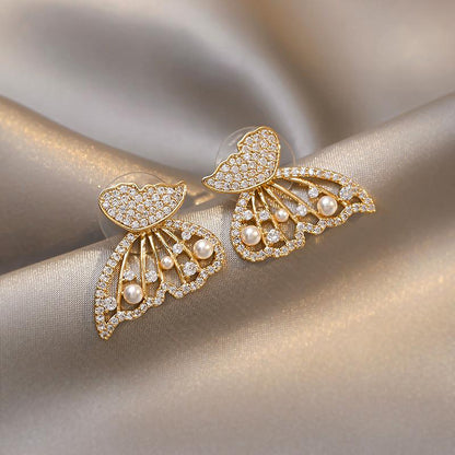 Skorter | Butterfly earrings with pearls and diamonds