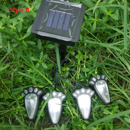 Skorter | Solar lamp in paw print design – LED garden lighting in multicolor for outdoor use