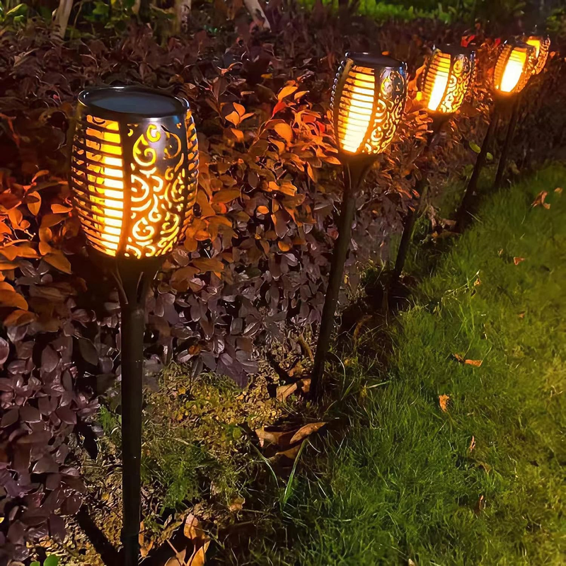 Skørter | 4 Pack LED Solar Torch with Flaming Happiness Outdoor Waterproof, Automatic On/Off Solar Garden