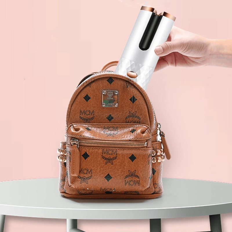 Skorter | Cordless automatic rotating curling iron